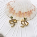 Golden snake ear cuff set with sparkling white and green zircon stones on white shell - Snake Style (77) / Gold