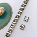 Detailed view of stainless steel modular link bracelet with gold floral motifs - Golden Rose Style (Style 107)
