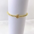 Detail of gold-plated beaded elastic bracelet with a micro-paved crystal letter C charm - Gold C