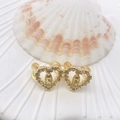 Golden heart-shaped ear cuff with sparkling zircons and a detailed religious saint icon - Heart Virgin Mary Style (90) / Gold