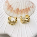 Elegant gold multi-layered U-shape ear cuff with zircon inlay on a white seashell - Triple-Layer Woven Wave Style (Style 37) / Gold