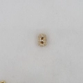 Macro shot of letter B gold pendant with pavé cubic zirconia on fabric background - Letter B Pendant / Gold