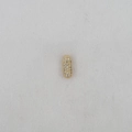 Detailed macro view of a gold balloon-style alphabet pendant with pave cubic zirconia - Letter I Pendant