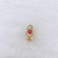 Detailed close-up of a golden girl charm with pink heart gemstone and sparkling zirconias - Pink Heart Girl Styles (220 Styles)