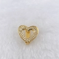 Close-up of golden heart-shaped clip accessory featuring sparkling pavé zircon stones - Gold Hollow Heart (Style 136)