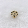 Detailed macro view of the gold-plated evil eye charm with black and white crystals - Gold Round Evil Eye (Style 192)