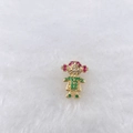 Detail of golden girl charm with colorful zircon stones on soft white fur background - Gold & Colorful Girl Designs (228 Styles)