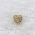 Detail of a golden heart charm with sparkling pavé crystals on white plush background - Gold Rhinestone Heart Style (196)