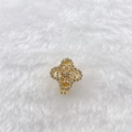 Macro shot of gold-plated flower clip earrings with clear crystals and pavé diamonds - Gold Marquise Cut Flower (Style 208)