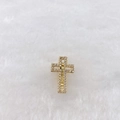 Detail of a golden cross pendant with micro-pave cubic zirconia on a soft white background - Golden Cross Pendant (Style 244)