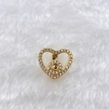 Macro detail of gold heart pendant with micro-pave cubic zirconia on white fur background - Gold Rhinestone Heart (Style 156)