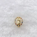 Detail of golden Virgin Mary pendant with colorful gemstones on white fur background - Gold Multi-gem Virgin Mary (Style 212)