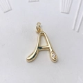Polished gold brass letter A pendant with sparkling micro-inlaid gemstone detail - Gold A