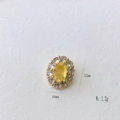 Detailed view of an oval yellow gemstone pendant with 10mm by 12mm dimensions - Yellow Stone Style (#1 Pendant Only)