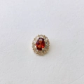 Macro detail of oval orange gemstone necklace with halo cubic zirconia setting - Orange Red Stone Style (#5 Pendant Only)