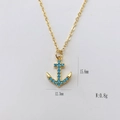 Collana con ciondolo ancora dorata e pietre blu, dimensioni 15,6 mm per 12,3 mm - Stile Ancora Zaffiro (#4)