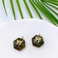 Detail of hexagonal natural stone pendants with gold butterfly and zircon inlay - Flash Stone (Labradorite)