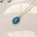 Macro détaillée d'un collier doré avec pendentif ovale en pierre bleue naturelle et zircon - Pendentif Uniquement (Sans Chaîne) / Bleu ciel (Pierre à veines bleues)
