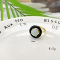 Minimalist golden open ring featuring a light cyan gemstone and black donut decoration - Light Green Stone Style (Style A)