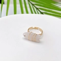Detail of fish shaped natural stone ring with gold wire wrapping and adjustable band - Clear Quartz Look (Style G)