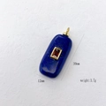 Lapis lazuli rectangular pendant with red gemstone and gold border including dimensions - Lapis Lazuli