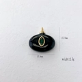 Elegant gold-plated black oval pendant with green marquise gemstone inlay and size labels - Black Agate