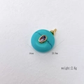 Turquoise stone round pendant with purple gemstone and gold trim, 20.8mm size - Turquoise