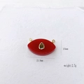 Red eye-shaped gemstone pendant necklace with green droplet inlay and gold frame - Red Jade