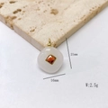 Détail du pendentif en pierre de 21mm x 16mm avec zircon orange serti au centre - Pendentif Uniquement (Sans Chaîne) / Cristal blanc