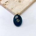Macro shot of oval blue stone pendant with gold inlay and green gem detail - Dark Oval Style / Pendant Only (No Chain) / Black Agate