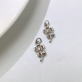 Detailed view of two silver floral charms with hanging loops for DIY jewelry making - Pendant Only (Without Chain)-Five-petal Flower (Style F) / Silver