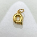 Detailed macro view of a 3D bubble letter Q pendant in polished gold plated finish - Gold Letter Q / Pendant Only (Without Chain)