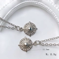 Macro shot of 11.5mm vintage sunburst pendant with zircon on polished silver chain - Gear Sunbeam Style (Style I)
