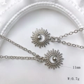 Detail of silver sun flower pendant with 11mm diameter and 0.7g weight specifications - Radial Dot Sunflower Style (Style K)