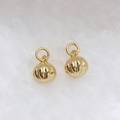 Macro shot of gold sphere pendants with vertical stripes on a soft white background - Necklace-Vertical Stripe Ball (Style P) / Gold