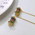Golden prayer cylinder necklace with colorful enamel rings and embedded heart symbols - Three-Color Ring Prayer Cylinder Pendant (Style G)