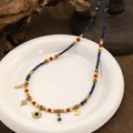 Collana vintage di lapislazzuli con ciondoli celesti a forma di sole luna e stelle - Collana di Perline Vintage Frammenti Cosmici (XL-1454CY)