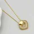 Elegante goldene Herz-Halskette mit Zirkonia-Anhänger und klassischer Kettenglieder-Struktur - Gold Halskette