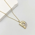 Golden necklace with letter D pendant featuring textured finish and sparkling zircon stones - Letter D