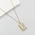Chic gold-plated letter E pendant necklace featuring zircon pavé and hammered texture - Letter E