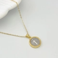 Detailed macro view of two-tone gold and silver Saint Benedict medal necklace pendant - Gold Style B Medium