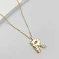 Fashionable gold letter R pendant necklace with hammered texture and white cubic zirconia - Letter R