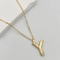 Golden necklace with hammer-textured letter Y pendant and sparkling zircon accents - Letter Y