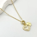Macro shot of gold heart nurse hat pendant necklace with sparkling cubic zirconia - Nurse Cap Heart Style (a)