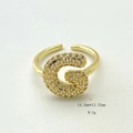 Gold plated open ring featuring letter G set with sparkling cubic zirconia stones - Gold G
