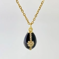 Collier doré avec pendentif œuf en émail noir orné de cristaux floraux raffinés - Noir Obsidienne (Style C)