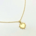 Detail of a golden heart pendant with a radiant beaded edge on a delicate thin chain - Radiant Rays Heart Style (Type B)