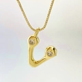 Elegant gold-tone necklace with an irregular U-shaped pendant featuring two sparkling zircons - Gold V