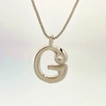 Elegant silver letter G pendant necklace with sparkling cubic zirconia accent - Silver G