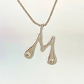 Minimalist silver-tone letter M pendant necklace with drop-shaped zircon accents - Silver M